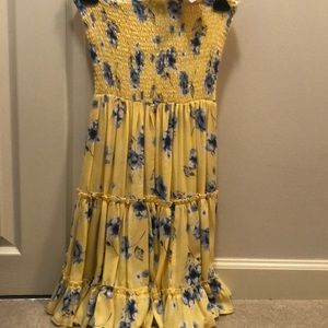 Yellow dress with blue flowers